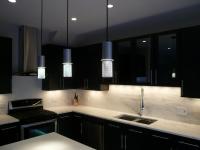 Simple Black Kitchen Design with Three Chandelier